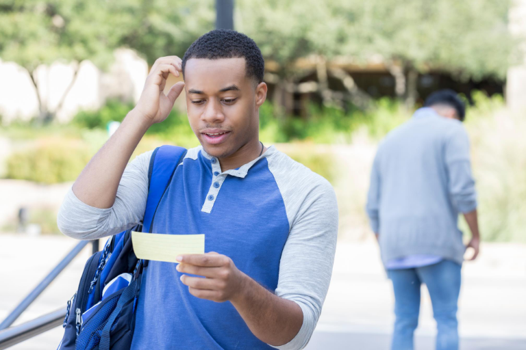 black male looking confusing on campus
