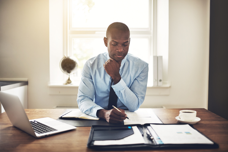 man sitting at a desk