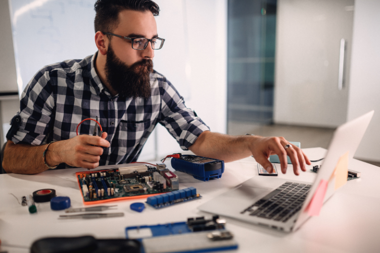 man working at computer