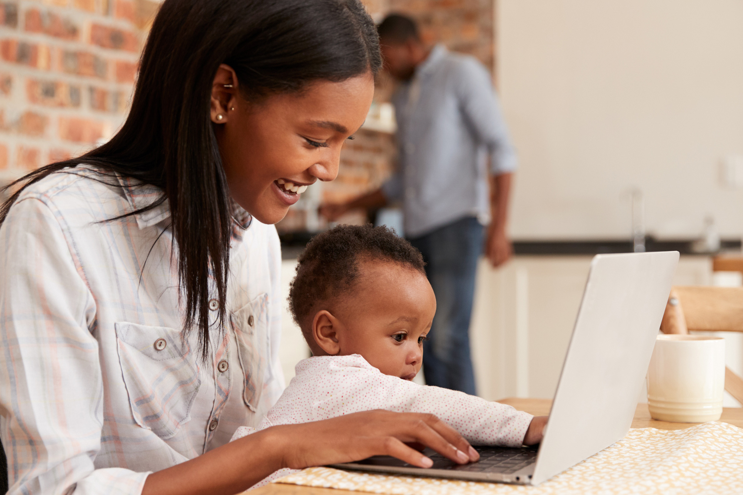 girl and child at computer